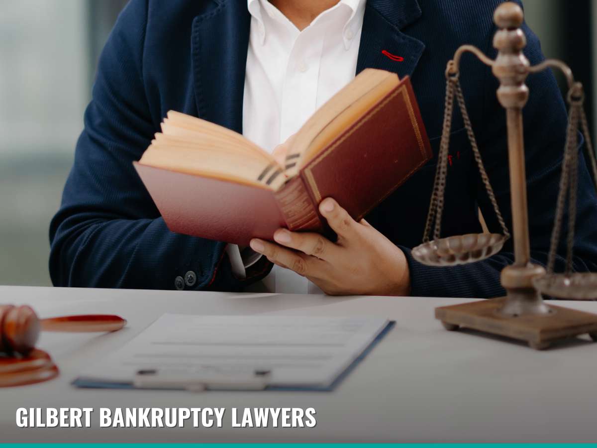 Gilbert bankruptcy lawyer reviewing legal documents related to Chapter 11 Bankruptcy cases